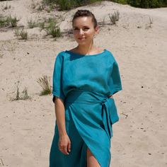 "A beautiful linen dress featuring a midi length, kimono style and a wrap skirt. - boat neck - shift blouson silhouette with wrap skirt - belted  - knee lenght (midi)  - half sleeves - gorgeous blue color! (other linen dresses and clothing for women: https://www.etsy.com/shop/MERCESStore) Fiber: linen 100% Color: deep blue For size 4 US / 36 EU: length- 40\"(102 cm) Our model is 165cm/5'4\" tall You may feel free choosing the size. Just send us your measurements (bust, waist, hips, height). We will define your correct size." Dresses Casual Modest, Wrap Dress Casual, Contemporary Dress, Dolman Dress, Linen Wrap Dress, Linen Kimono, Contemporary Dresses, Boat Neck Dress, Linen Clothing