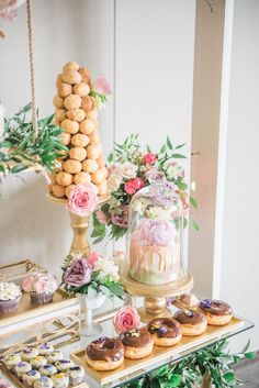 an assortment of desserts and pastries on a table