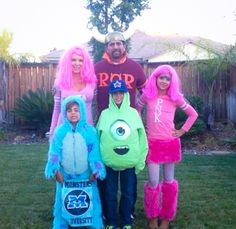 the family is dressed up in costumes for halloween