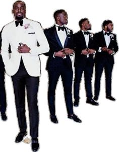 a group of men in tuxedos standing next to each other