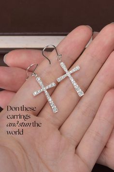 Don these stylish CZ Classical Cross Sterling Silver Dangle Earrings and stun the world with your beauty. These sterling silver earrings have just enough sparkle to light up your outfit of the day. Get these for yourself, a loved one or a close friend today. Sterling Silver Dangle Earrings