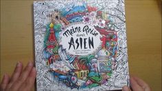 an adult coloring book with colored pencils in front of it and the title'monne gras asia '