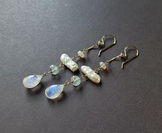 "Make sure to read all of the information below before you make a purchase: Made to order.  Current production times for made to order items can be found in the shop announcement or on the shop policies page.   Elegant, beachy earrings - the perfect summer accessory!   ~ rainbow moonstone, white biwa pearls, aquamarine, Ethiopian opal ~ gold filled, sterling silver, or rose gold filled wire and ear wires  ~ approximately 2 5/8 inches (6.7 cm), from the top of the ear wire to the bottom of the mo Handmade Long Drop Pearl Earrings As Gift, Handmade Long Drop Pearl Earrings For Gifts, Handmade Long Drop Pearl Earrings, Silver Beaded Earrings, Abalone Earrings Handmade, Natural Stone Dangle Pearl Earrings, Wire-wrapped Moonstone Dangle Earrings, Handmade Aquamarine Dangle Earrings, Elegant Handmade Abalone Shell Earrings