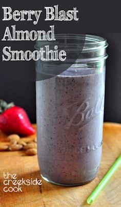 berry blast almond smoothie in a mason jar