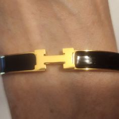 Black And Gold Slim H Bracelet. Stainless Steel Non Tarnishing Hypoallergenic Can Be Worn Daily. Bangles That Can Be Worn Separately Or Mixed With Others. Holiday Gift. 11/30 Elegant Black Bracelets For Everyday, Chic Black Bracelets For Formal Occasions, Black Enamel Bracelets For Parties, Elegant Bracelets With Black Band, H Bracelet, Daily Water, Jewelry Black, Lucky You, Initial Bracelet