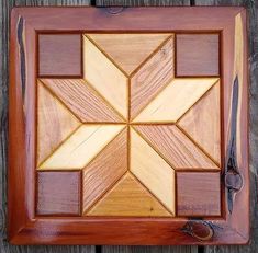 a wooden cutting board with scissors on it