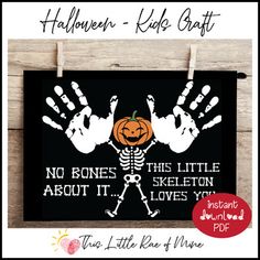 a cross stitch pattern with a skeleton holding a pumpkin and handprints on it