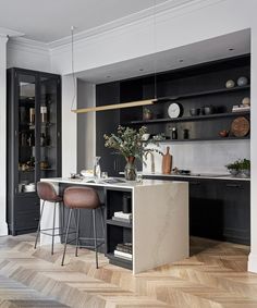 the kitchen is clean and ready to be used as a dining room or office space