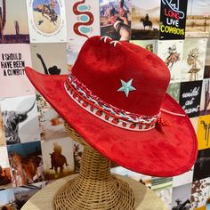 One-of-a-Kind handmade hat -This fun festive hat features a western buckles and different star detailing -Size Large Made in U.S.A Red Western Fedora For Kentucky Derby, Country Style Flat Brim Costume Hat For Rodeo, Country Style Flat Brim Rodeo Costume Hat, Western Style Hat For Rodeo, Western Style Red Felt Hat For Winter, Western Brimmed Costume Hats For Rodeo, Western Red Felt Hat For Winter, Western Style Red Hat Bands For Winter, Western Style Top Hat For Summer Festivals