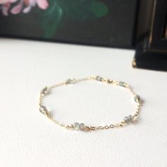 ✨ Dainty Labradorite Bracelet with 14K Gold Filled, Rose Gold Filled or Sterling Silver. • Handmade with genuine raw Labradorite crystals. Delicate & subtle bracelet that will match with any style, make a perfect gift & a treat for yourself 💜 ✨ Labradorite is believed to link us to the spirit world and help to reach a deeper spiritual consciousness. It is a popular gemstone for your intention setting, astral projections, or daily meditation rituals 🔮• Bracelet comes with a 0.5-inch ext Spiritual Consciousness, Raw Labradorite, Pola Gelang, Intention Setting, Gelang Manik, Spirit World, Labradorite Bracelet, Ball Bracelet, Daily Meditation