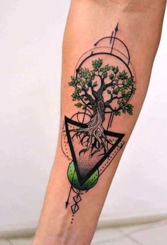 a tree with an arrow tattoo on the leg