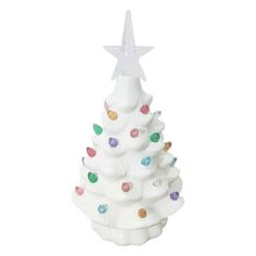 a white ceramic christmas tree with multicolored lights and a star on the top