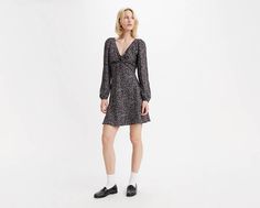 This Delray Long-Sleeve Mini Dress has all of our favorite style notes: A flattering V-neckline with tie detailing, bishop sleeves and a mini cut that hits just right. An essential mini dress Cut with an A-line silhouette Features tie detailing at the chest With bishop sleeves Classic V-neck Mini Dress With Buttons, Fitted V-neck Belted Mini Dress, Fitted V-neck Mini Dress With Button Closure, Spring Long Sleeve Mini Dress With Double-breasted Buttons, Feminine Printed V-neck Mini Dress, Dress Cuts, Long Sleeve Mini Dress, Dress Skirt, Multi Color