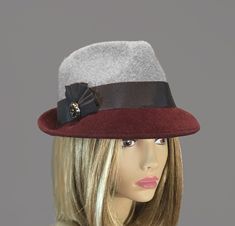 This beautiful ladies fedora is made from fur felt, and hand draped over an antique hat block. Hand finished with authentic millinery techniques. Created with two colors of felt, and embellished with grosgrain and twill ribbons. Please indicate your head size measurement when ordering (measure your head horizontally just above your eyebrows). When you receive your hat, there will be a small ribbon inside to fine-tune the fit, and a hat box for safe storage. Note: Colors will vary depending on yo Trilby Fedora, Antique Hat, Hat Blocks, Antique Hats, The Villages, Millinery Hats, Hat Box, Safe Storage, Beautiful Ladies