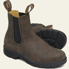 Rustic brown boots to last you through many seasons, days, nights, locations, while maintaining the go-to look that’s fashionable in all situations. These Blundstone Chelsea boots are a great accompaniment to all outfits. SPECIFICATIONS Rustic brown premium water-resistant leather Black elastic side Classic brogue detailing Leather lined Durable TPU outsole Cushioned midsole for comfort SPS Max Comfort system for outstanding shock absorption Removable footbed Lightweight and comfortable Australian Boots, Blundstone Women, Womens Casual Boots, Blundstone Boots, High Top Boots, Chelsea Boots Women, Suede Leather Boots, Leather High Tops, Pull On Boots