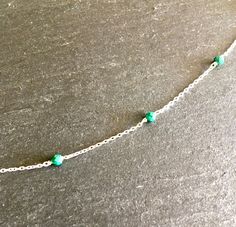 Malachite necklace in 925 silver, fine cable chain, alternating a dozen small faceted balls in malachite of a pretty veined emerald green. Malachite is the birthstone for August. Length 40 cm + 2 cm, 2.5 cm chain between each bead, 3 mm beads, malachite finishes. A colorful necklace, to wear alone or layered. Green Sterling Silver Necklace With Delicate Chain, Malachite Earrings, Malachite Necklace, Sterling Silver Choker, Colorful Necklace, Lapis Lazuli Earrings, Lapis Lazuli Necklace, Green Malachite, Silver Choker