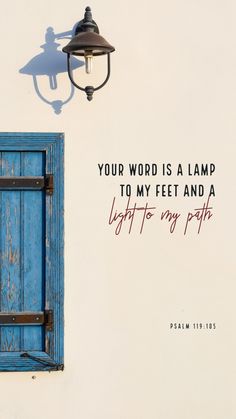 a blue door with a light hanging from it's side and the words your word is a lamp to my feet and a light to my path