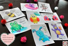 five hand drawn and watercolored valentine cards with pom poms around them