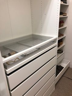 an empty shoe storage unit in a closet