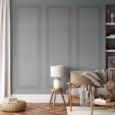 a living room with gray walls and wooden furniture