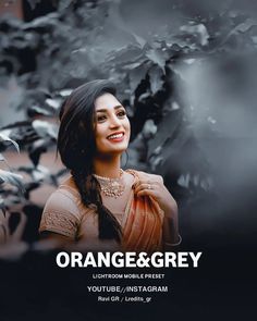 an advertisement for orange & grey featuring a smiling woman