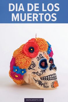 a skull with flowers on its head and the words dia de los muertos