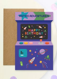 a birthday card with an old fashioned arcade machine and space theme on the front that says, happy birthday