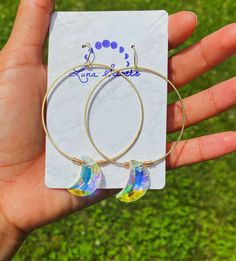 Rainbow Moon Phase Suncatcher Gold Hoop Earrings. 2 1/2 and 60 mm hoop diameter size. Each Moon phase pair of earring is opposite to each other. Angel Aura, Moon Phases, Gold Hoop, Gold Hoop Earrings, Suncatchers, Alex And Ani Charm Bracelet, Aura, Etsy Earrings, Hoop Earrings