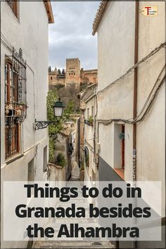 an alley way with the words things to do in granada besides the alhambra