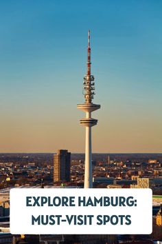 Television tower in Hamburg against an urban skyline at sunset, with text overlay: "Explore Hamburg: Must-Visit Spots". The Fish