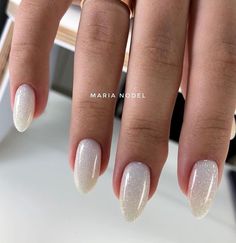 Nails White And Sparkle, White And Glitter Nails Short, Neutral Nail With Glitter, White Glittery Almond Nails, Bachelorette Nails The Bride White, Nails White With Glitter, Milky White Sparkly Nails, Sparkly White Acrylic Nails, White Nails Gold Glitter