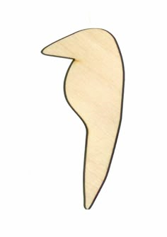 an unfinished wooden cutout of a bird