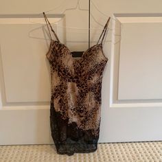 Very Sexy Vs Chemise, Size 34b. Lace Details On The Bottom And This Is The Softest Thing You Can Put On Your Body! Worn Once, Condition Like Brand New. Adjustable Straps. Leopard Print Top With Built-in Bra For Night Out, Victoria's Secret V-neck Camisole For Party, Victoria's Secret Fitted Lace Camisole, Fitted Lace Camisole By Victoria's Secret, Victoria's Secret Spaghetti Strap Camisole For Night Out, Victoria's Secret V-neck Camisole For Night Out, Victoria's Secret Fitted Camisole For Party, Victoria's Secret Spaghetti Strap Top For Night Out, Victoria's Secret Fitted Spaghetti Strap Camisole