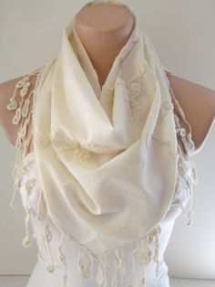 Cream triangle shawl scarf This   scarf  is made of soft fabric also surrounded by fringe. It's very elegant and feminine.  Great dress up your outfit. For fashion forward woman. Can use it everyday everywhere.Wraps around your neck and shoulders as well as keep you warm.You have many options with this accessory. It can be shawl,necklace,headband and such. Apprx- Lenght:1.60 cm-63 inches             Wide  . 50   cm-19 inches Please make hand wash in cold water and use mild detergent. Thanks for Luxury Cream Scarves For Formal Occasions, Luxury Romantic Scarves For Women, Triangle Infinity Scarf, Luxury Cream Formal Scarves, Cream Scarf, Triangle Shawl, Scarf With Fringe, Brown Polka Dots, Triangle Shawls