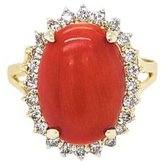 14 Karat Yellow Gold Ring Featuring A10mm x 14mm Oval Cabochon Cut Coral Accented By 24 Round Brilliant Cut Diamonds Of SI Clarity & I/J Color Totaling 0.24 Carats. Finger Size 8. Finished Weight Is 3.6 Grams. White Coral Ring, Yellow Gold Cocktail Ring, Coral Accents, Vintage Cocktail Ring, Gold Cocktail Ring, Gold Cocktail, Diamond Cocktail Rings, Halo Diamond Ring, One Ring