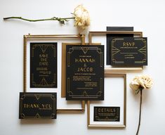 black and gold wedding stationery with white flowers