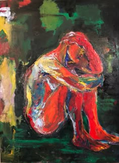 an abstract painting of a woman sitting on the ground with her arms around her body