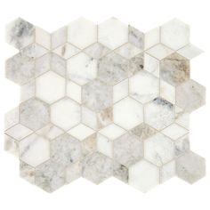 a white marble mosaic tile with hexagonal shapes