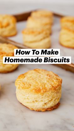 some biscuits are sitting on a baking sheet