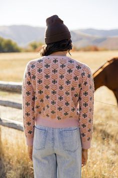 The Meadow Floral Cardigan is one you want in your closet. Featuring floral material, functional buttons, and thick material, this pretty pink cardi will bring some joy to those gloomy winter days! // paired with the on my own tie waist pants Winter Floral Print Pink Outerwear, Winter Pink Floral Print Outerwear, Fall Floral Print Long Sleeve Cardigan, Floral Print Long Sleeve Fall Cardigan, Long Sleeve Floral Print Fall Cardigan, Winter Pink Outerwear With Floral Print, Pink Floral Print Outerwear For Fall, Pink Sweater For Cold Weather In Fall, Pink Sweater For Fall Cold Weather