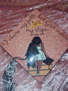 a graduation cap with an image of a woman on it