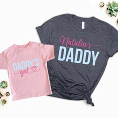 Father-Daughter Bond, Captured on a Tee!  Looking for a heartwarming way to celebrate the special bond between fathers and daughters? Look no further! Introducing our customizable t-shirt set, perfect for daddies and their little girls. 👕 Customizable Comfort: Crafted from soft, high-quality fabric, our t-shirts offer both comfort and style. Plus, with customizable options, you can add a personal touch that makes each shirt uniquely yours. 👧 Daddy's Girl: Adorned with the sweet phrase "Daddy's Father Daughter T Shirts, Fathers And Daughters, Father Daughter Bond, Daddy And Daughter, Girl Shirt, Father Daughter, Dolly Parton, Shirts For Girls, Custom Name