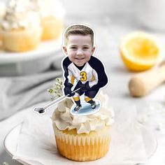 a cupcake with an image of a hockey player on it