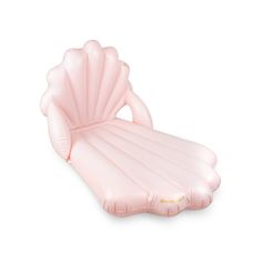 an inflatable chair that looks like a seashell on the beach or pool