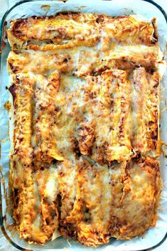 an enchilada casserole in a glass baking dish