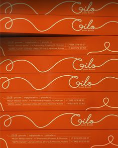 an orange menu with white lines on it and the words golo written in cursive writing