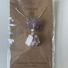 The Healing Necklace is a powerful trio of stones—Amethyst, Pink Tourmaline, and Selenite—crafted to support emotional healing, spiritual growth, and inner peace. Each stone brings its unique energies, making this necklace a beautiful and meaningful piece for anyone on a journey of healing and transformation. Amethyst: Known for its calming and spiritual properties, Amethyst is often used to enhance intuition, reduce stress, and promote inner peace. Pink Tourmaline: A stone of love and compassio Healing Rose Quartz Gemstone Necklace, Spiritual Rose Quartz Gemstone Necklaces, Rose Quartz Gemstone Necklaces For Meditation, Rose Quartz Gemstone Necklace For Meditation, Gemstone Pendant Charm Necklace For Meditation, Rose Quartz Pendant Necklaces For Healing, Rose Quartz Pendant Necklace For Healing, Spiritual Raw Stone Necklace For Gift, Spiritual Fluorite Jewelry For Meditation