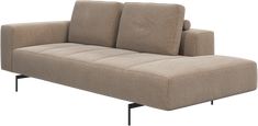 a beige couch sitting on top of a metal frame