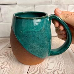 angle dipped mug with Teal Glaze over deep red stoneware clay. beautiful color and textures Pottery Sale, Northwest Style, Handcrafted Pottery, Wheel Thrown Pottery, Thrown Pottery, Pottery Mug