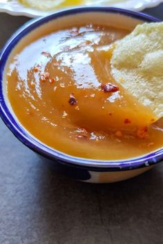 sweet mango chili sauce with vegan and gluten free chips in a bowl